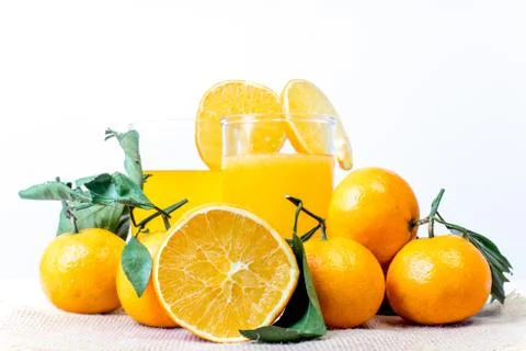 Different fruit and juice or smoothie in a glass Stock Photos
