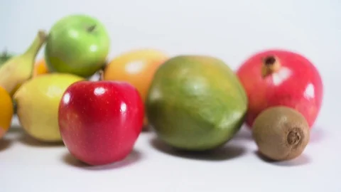 Different fruit on white background, panning, shallow Depth of field 스톡 동영상 75815936
