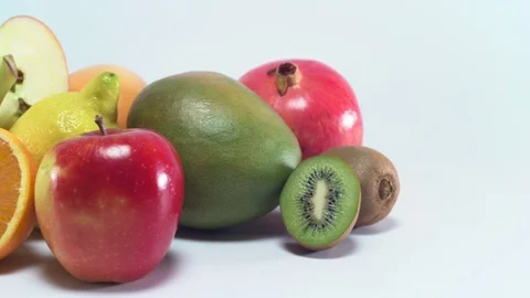 Different fruit on white background, sliding Video stock 75818149