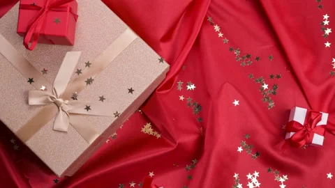 Different  Gift on a red background. Video stock 146648077