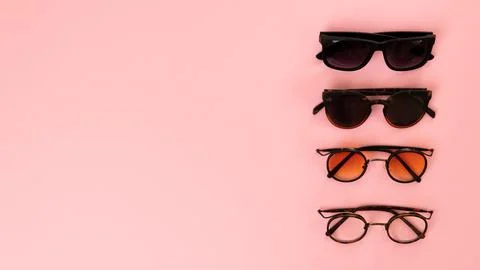 Different glasses on a bright background with space for inscription Stock Photos
