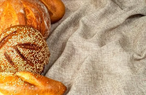 Different grades of bread on sacking Stock Photos