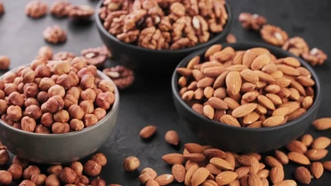 Different grains of shelled nuts, rotation. Stock Footage 156476171