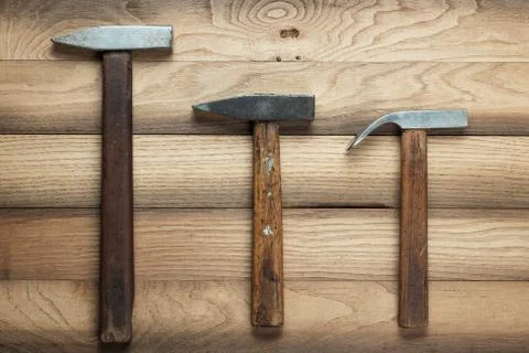 Different hammers on the table Stock Photos