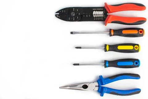 Different hand tools on a white background close-up. Stock Photos