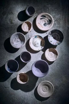 Different handmade ceramic on background.. Stock Photos