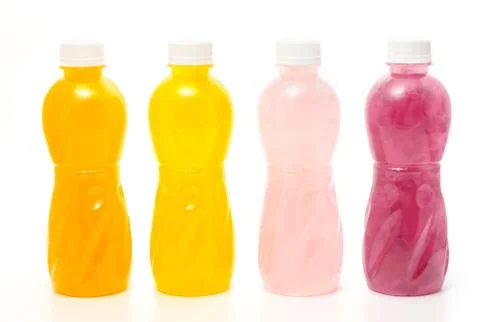 Different of healthy drinks in plastic bottles on white background Stock Photos