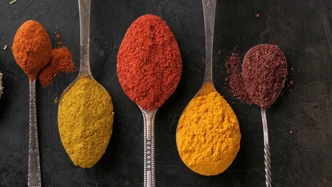 Different Indian spices in spoons Stock-Footage 129714359