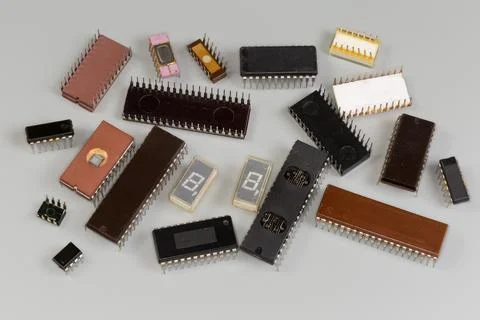 Different integrated circuits in plastic and ceramic DIP packages Stock Photos