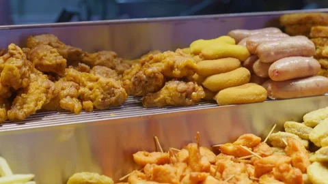 Different kind of fast deep fry foods made of potatoes and chicken Stock Footage 322779162