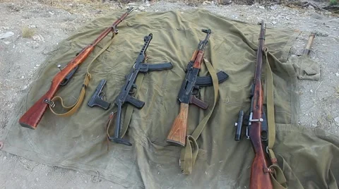 Different Kind of Machine Guns and Pistols Stock Footage 60605479