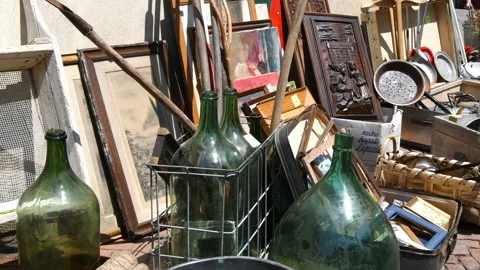 Different kind of old objects displayed on the ground Stock Footage 143915457