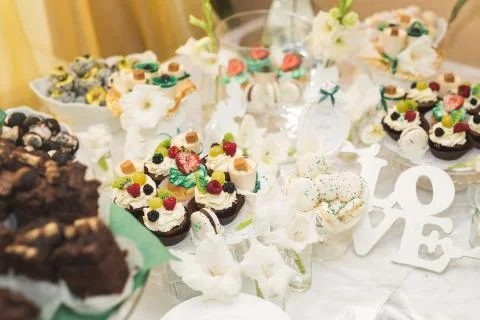 Different kinds of baked sweets on a buffet Stock Photos