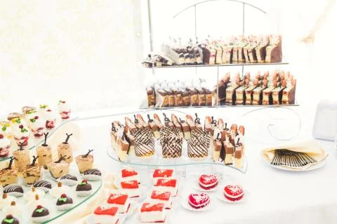Different kinds of baked sweets on a buffet Stock Photos
