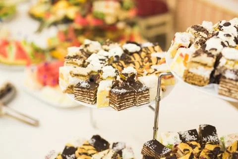 Different kinds of baked sweets on a buffet Stock Photos
