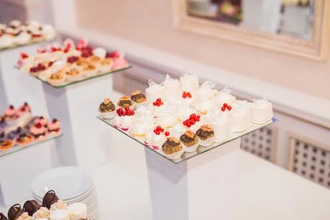 Different kinds of baked sweets on a buffet Stock Photos