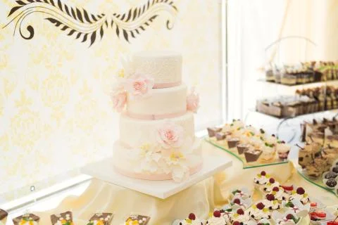 Different kinds of baked sweets on a buffet Stock Photos