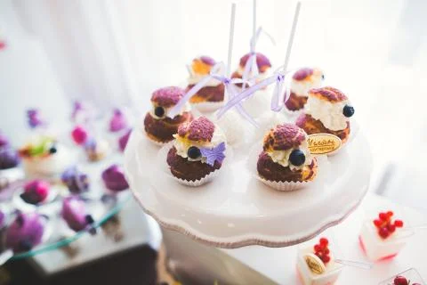 Different kinds of baked sweets on a buffet Stock Photos