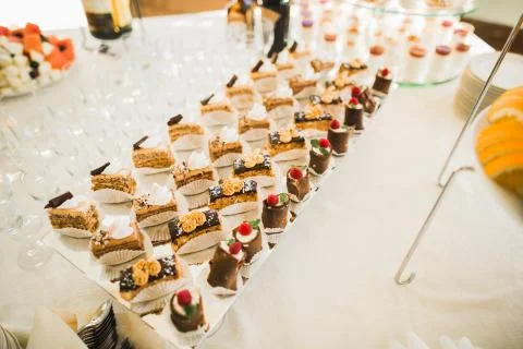 Different kinds of baked sweets on a buffet Stock Photos