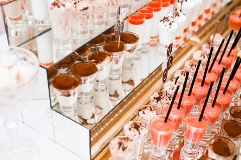 Different kinds of baked sweets on a buffet Stock Photos