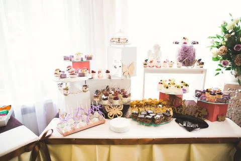 Different kinds of baked sweets on a buffet Stock Photos