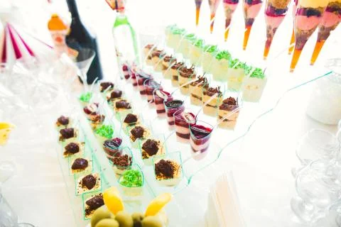 Different kinds of baked sweets on a buffet Stock Photos