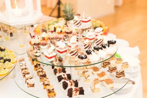 Different kinds of baked sweets on a buffet Foto stock