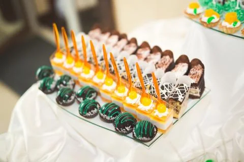 Different kinds of baked sweets on a buffet Stock Photos
