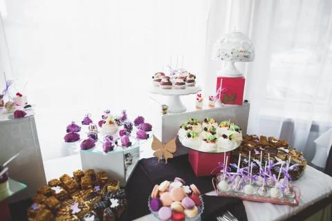 Different kinds of baked sweets on a buffet Stock Photos