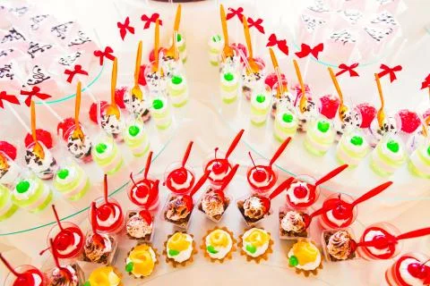 Different kinds of baked sweets on a buffet Stock Photos