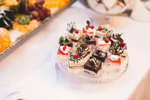 Different kinds of baked sweets on a buffet Stock Photos