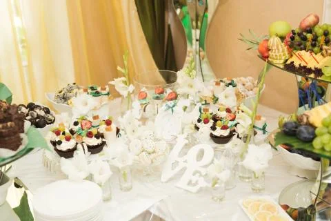 Different kinds of baked sweets on a buffet Stock Photos