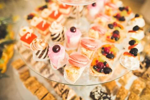 Different kinds of baked sweets on a buffet Stock Photos