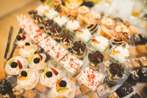 Different kinds of baked sweets on a buffet Foto stock