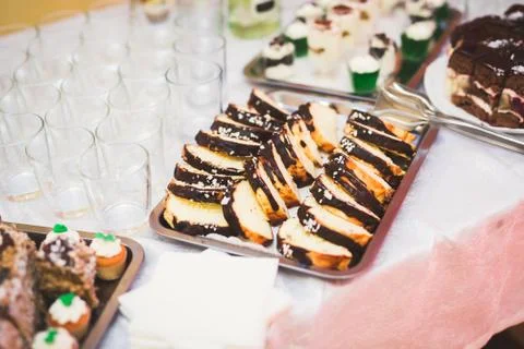 Different kinds of baked sweets on a buffet Stock Photos