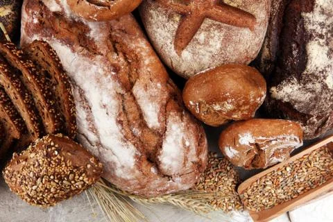 Different kinds of bread and bread rolls. Kitchen or bakery poster design Stock Photos