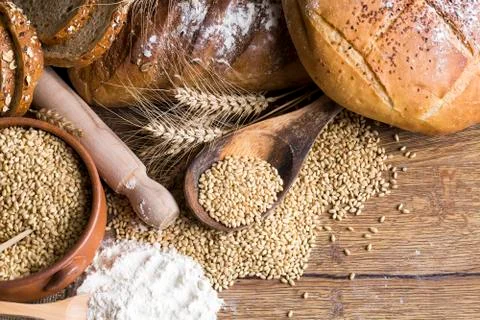 Different kinds of bread and bread rolls. Kitchen or bakery poster design Stock Photos