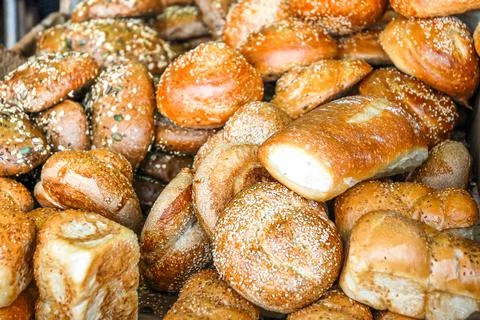 Different kinds of bread on a market's stall Stock Photos