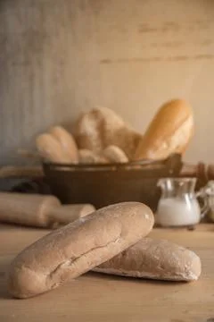 Different kinds of bread rolls on table wooden from above. Kitchen or bakery Fotos de archivo