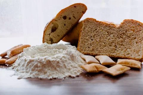 Different kinds of breads with flour Stock Photos