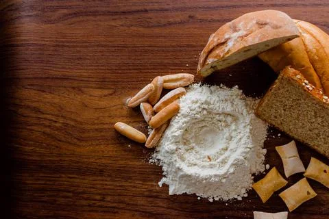 Different kinds of breads with flour Stock Photos