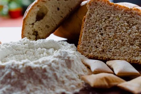 Different kinds of breads with flour Stock Photos