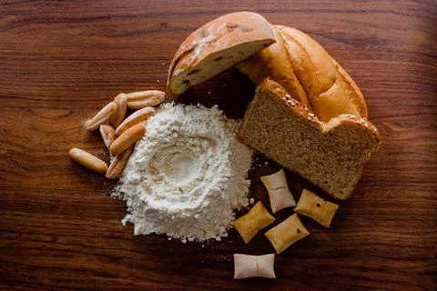 Different kinds of breads with flour Stock Photos