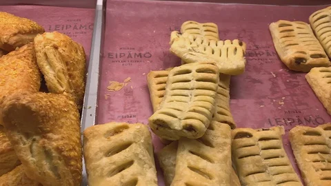 Different kinds of breads on the pantry in Finland 動画素材 128095673
