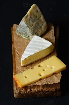 Different kinds of cheeses Stock Photos