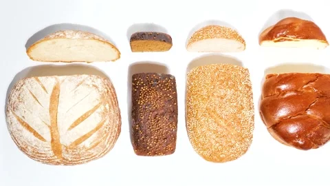 Different kinds of fresh bakery breads with slices 動画素材 158880541