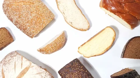 Different kinds of fresh bakery breads with slices 動画素材 158880579