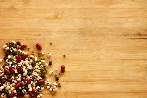 Different kinds of Grains, five grains put on wooden background. Stock Photos