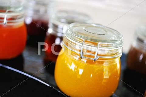 Different Kinds Of Marmalade In Jam Jars