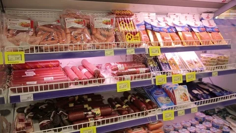 Different kinds of meat products and sausages on the display Stock Footage 75488337